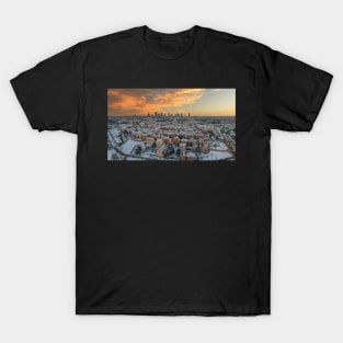 Warsaw old town, snow-covered roofs and and distant city center at dusk T-Shirt